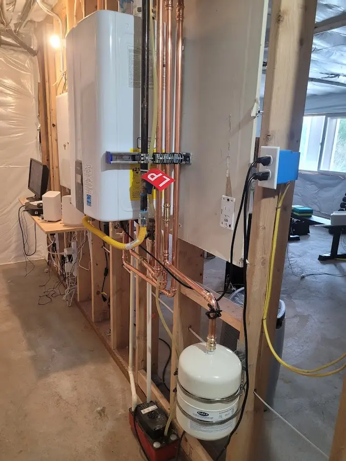 Licensed plumber repairing a kitchen sink in El Paso